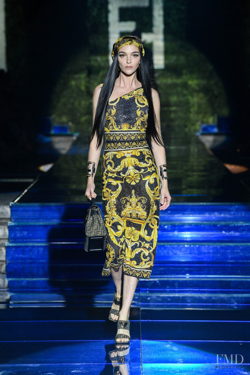 Mariacarla Boscono featured in  the Fendi by Versace fashion show for Spring/Summer 2022