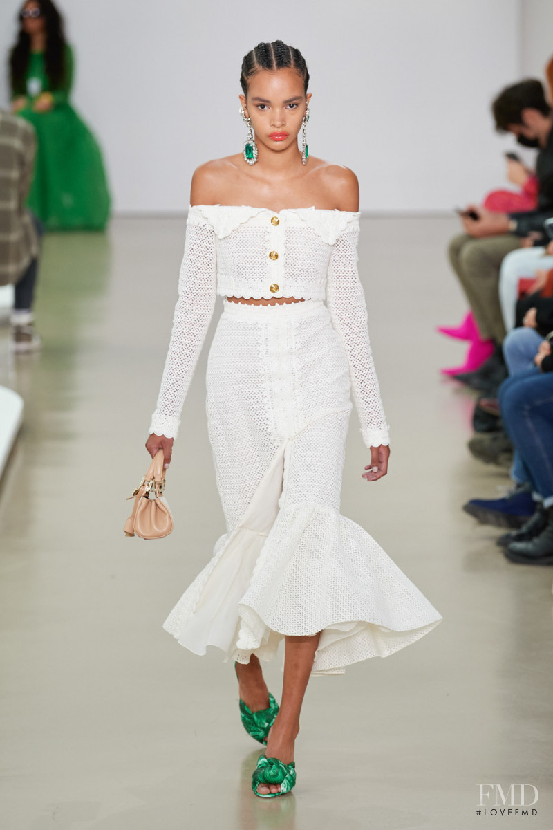 Naomi Ekindi Dioh featured in  the Giambattista Valli fashion show for Spring/Summer 2022