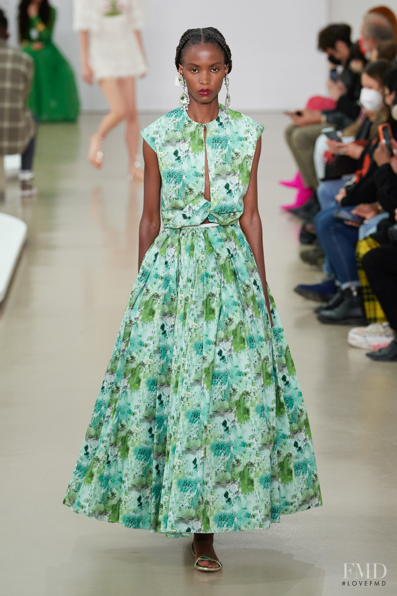 Christine Munezero featured in  the Giambattista Valli fashion show for Spring/Summer 2022