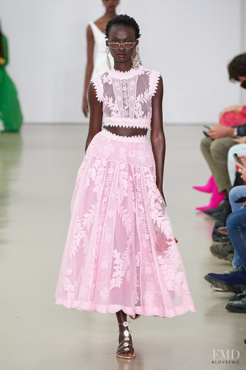 Aliet Sarah Isaiah featured in  the Giambattista Valli fashion show for Spring/Summer 2022