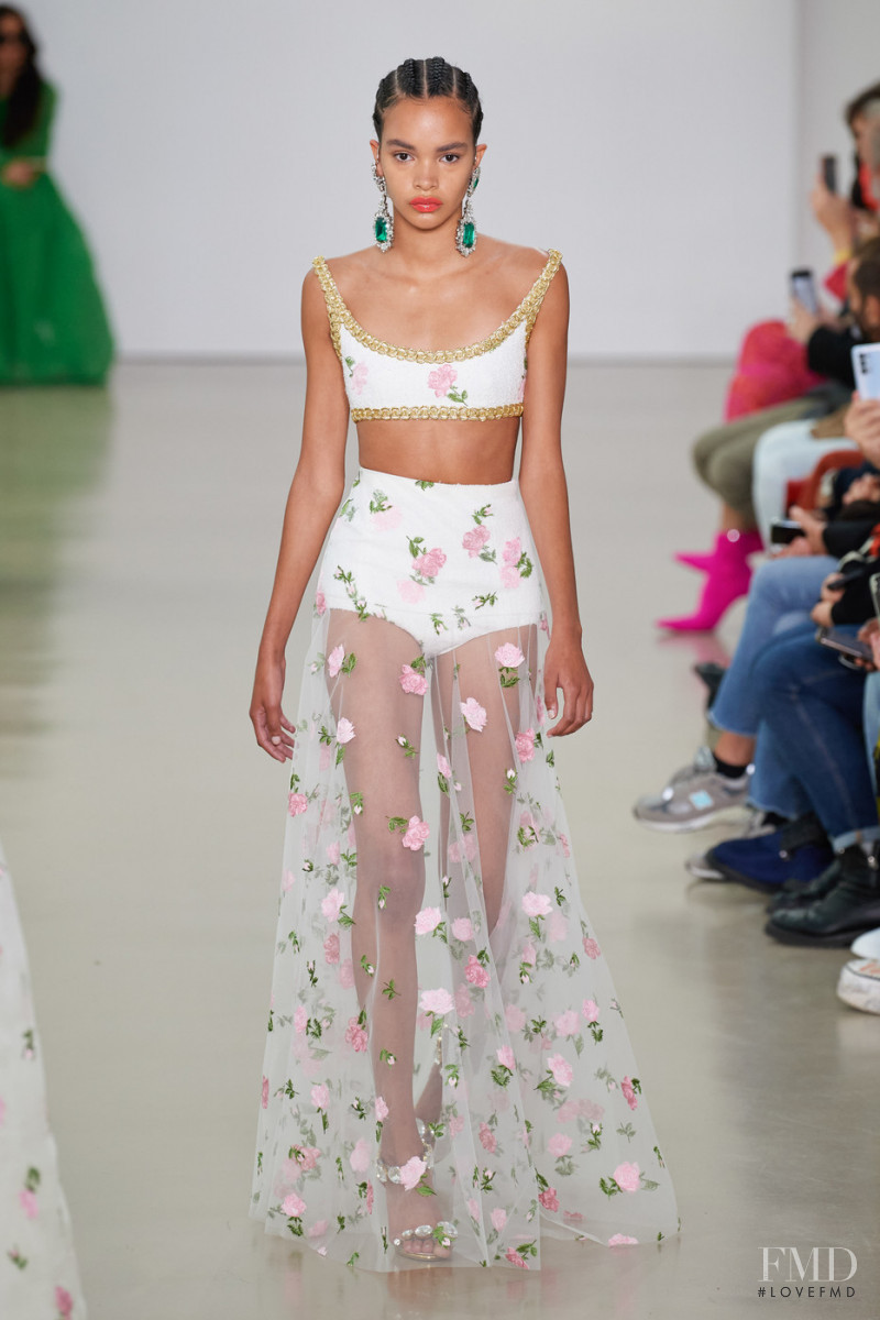 Naomi Ekindi Dioh featured in  the Giambattista Valli fashion show for Spring/Summer 2022