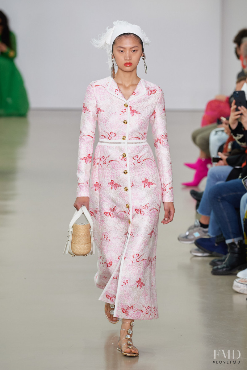 Yilan Hua featured in  the Giambattista Valli fashion show for Spring/Summer 2022