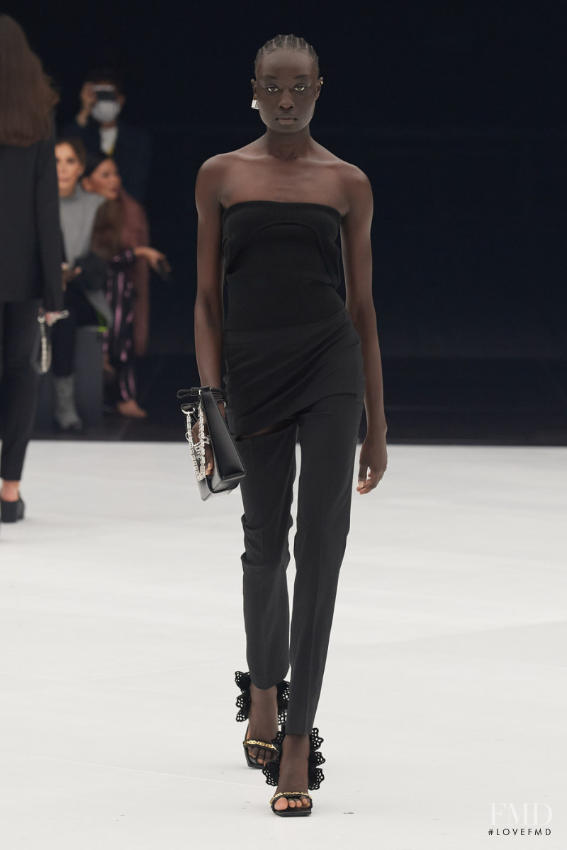 Nyagua Ruea featured in  the Givenchy fashion show for Spring/Summer 2022