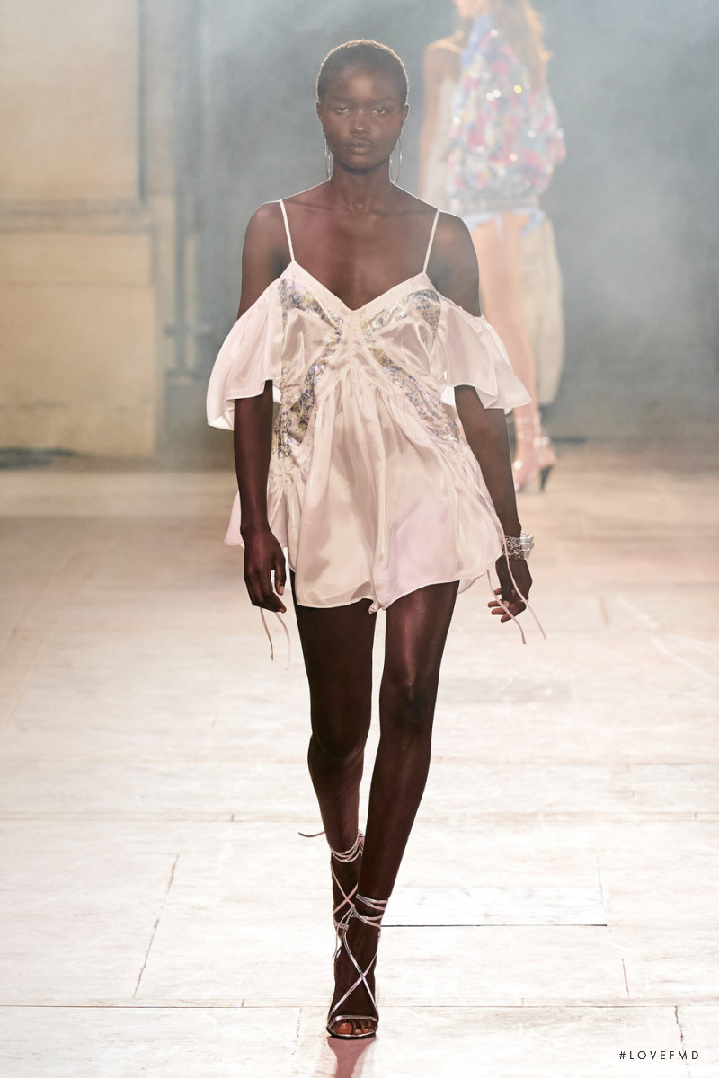Akon Changkou featured in  the Isabel Marant fashion show for Spring/Summer 2022