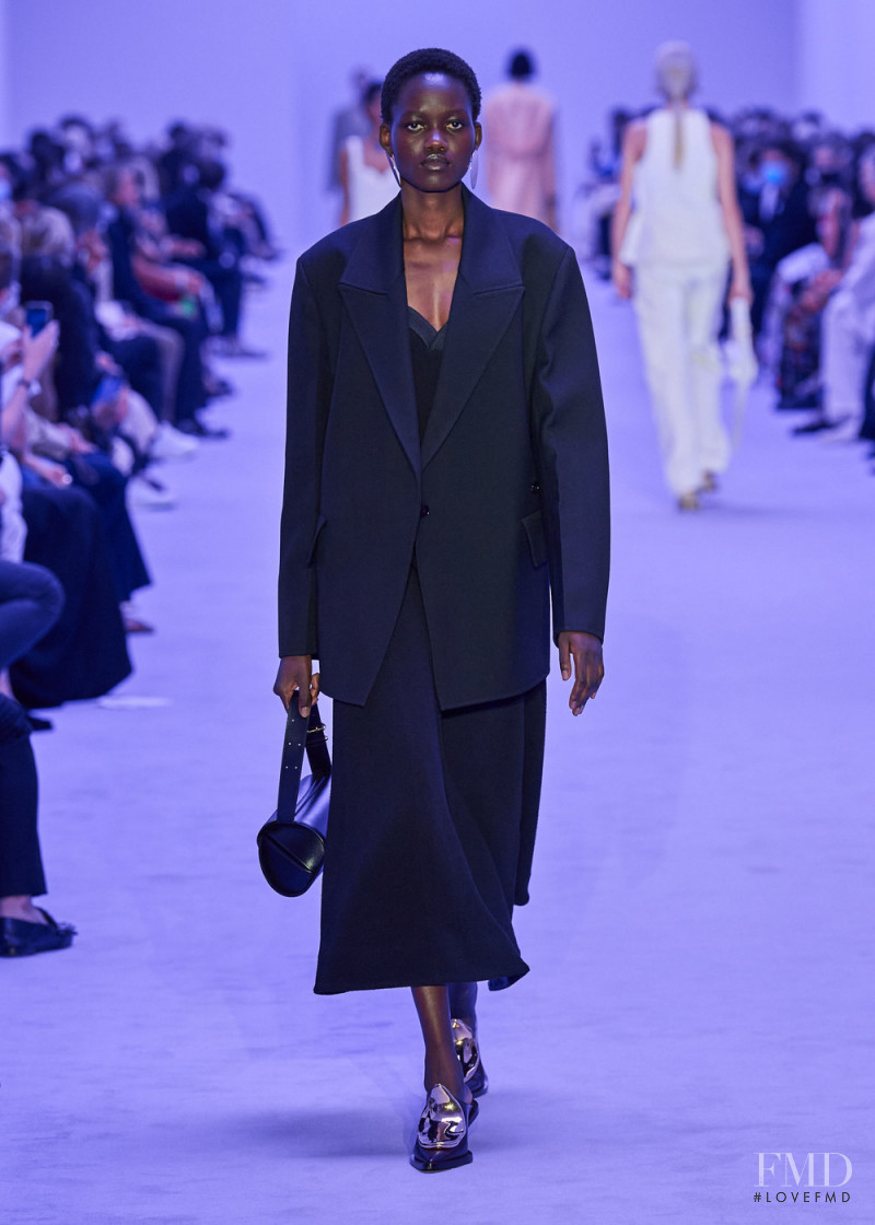 Caren Jepkemei featured in  the Jil Sander fashion show for Spring/Summer 2022