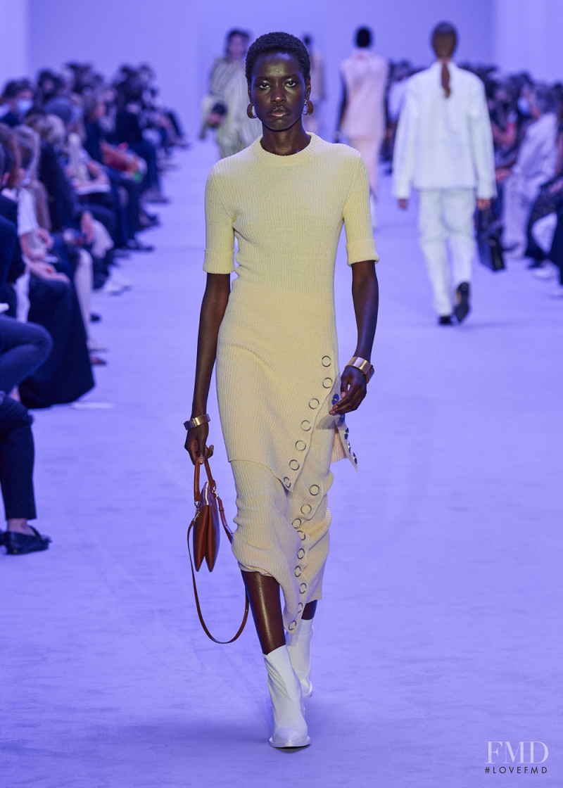 Awar Odhiang featured in  the Jil Sander fashion show for Spring/Summer 2022