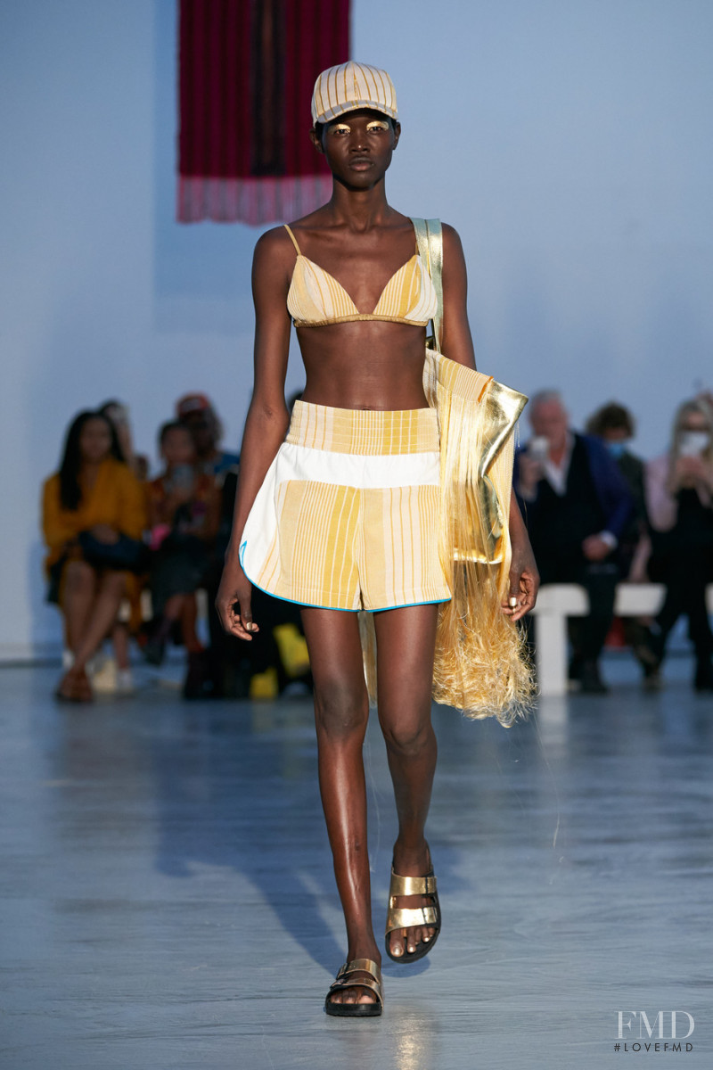 Anyiel Majok featured in  the Kenneth Ize fashion show for Spring/Summer 2022