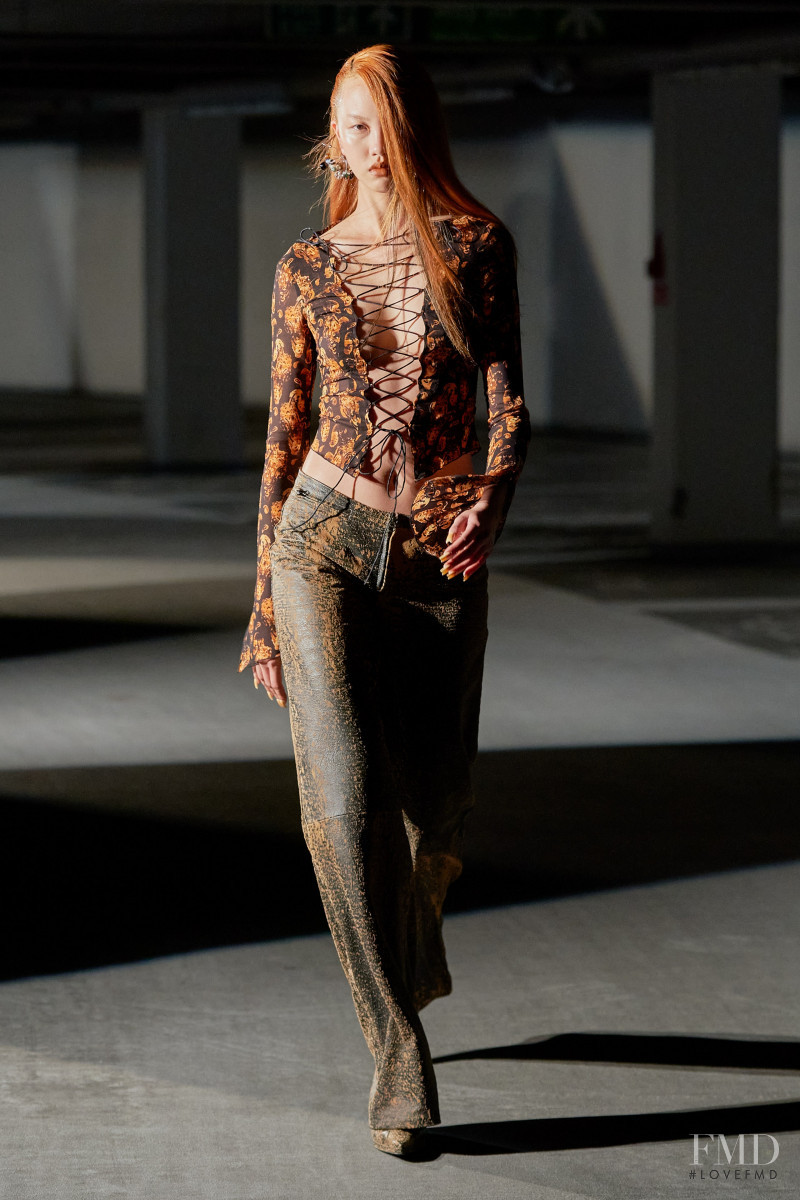 Jan Baiboon Arunpreechachai featured in  the Knwls fashion show for Spring/Summer 2022