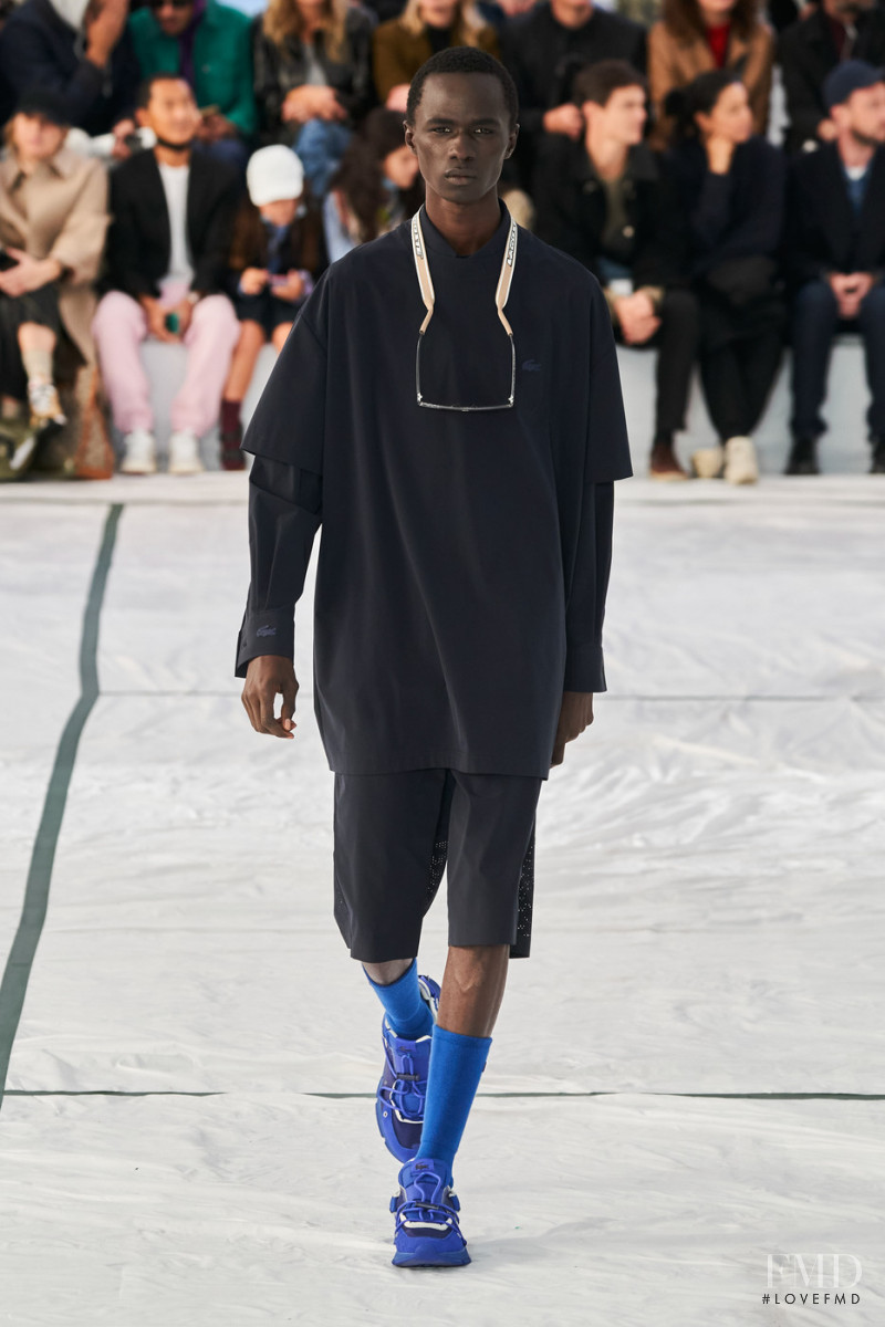 Malick Bodian featured in  the Lacoste fashion show for Spring/Summer 2022
