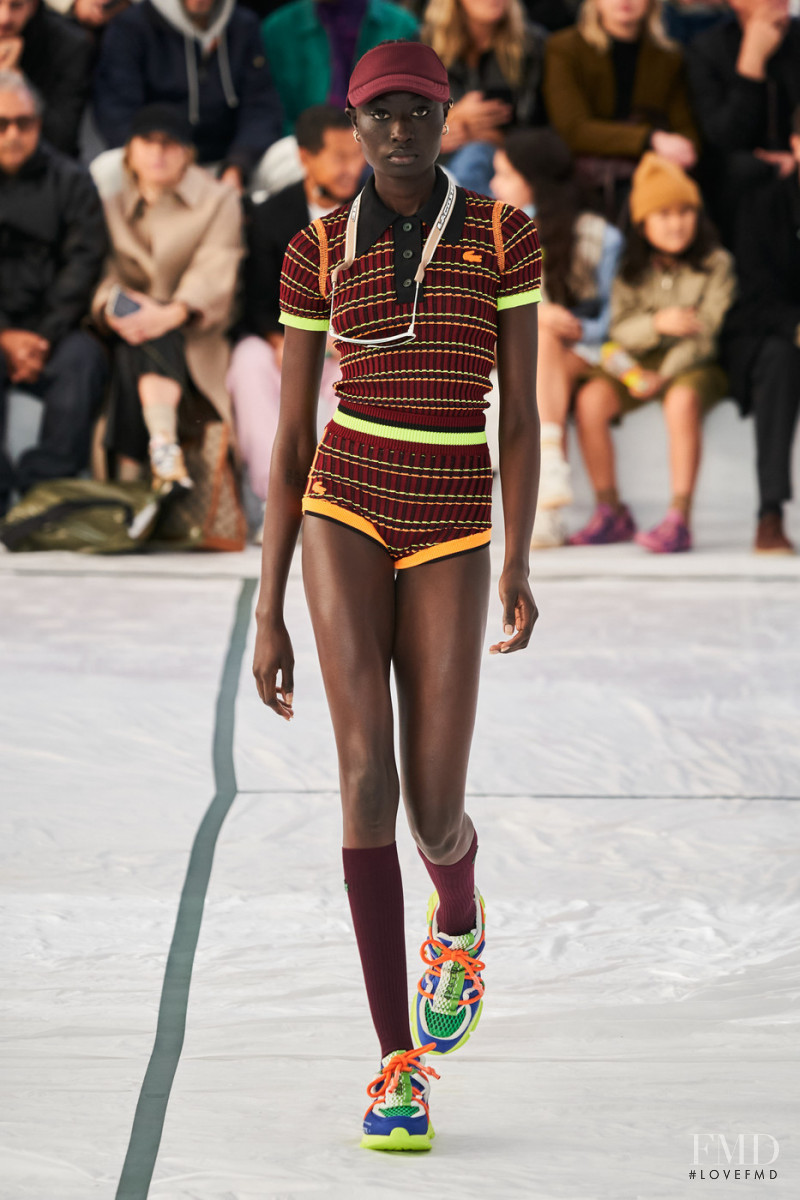 Nyagua Ruea featured in  the Lacoste fashion show for Spring/Summer 2022