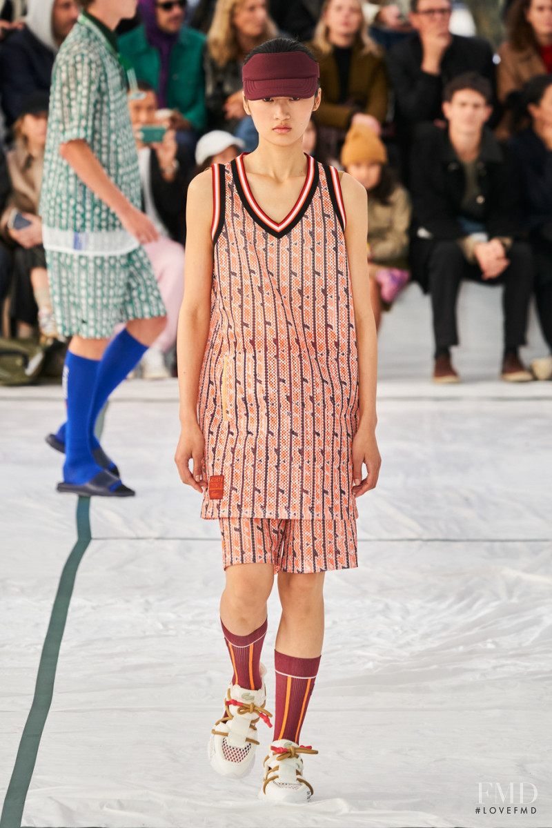 Yilan Hua featured in  the Lacoste fashion show for Spring/Summer 2022