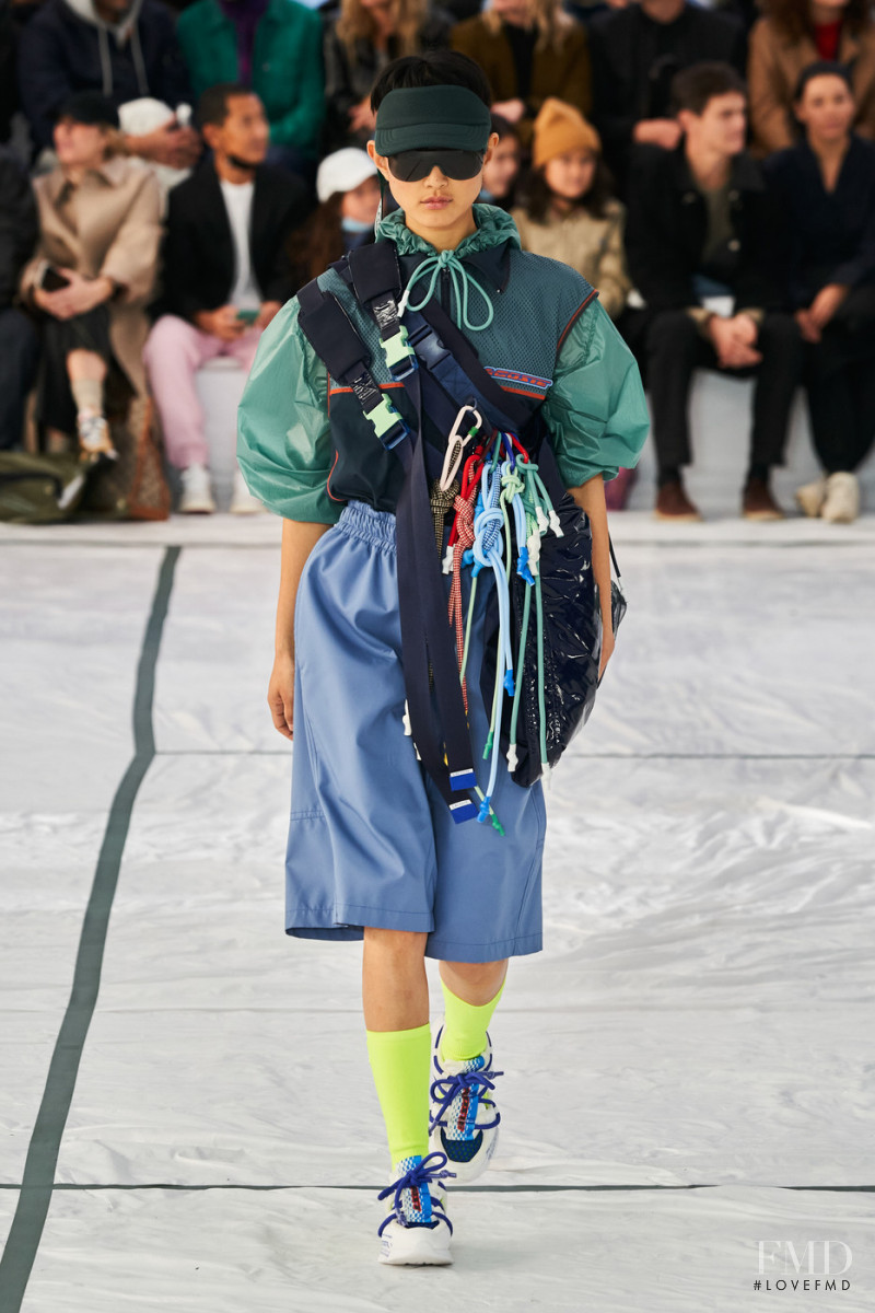 Eny Jaki featured in  the Lacoste fashion show for Spring/Summer 2022