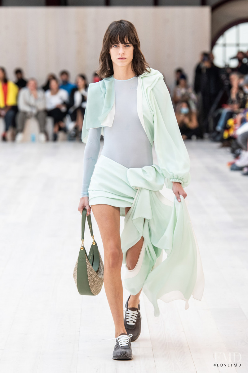Miriam Sanchez featured in  the Loewe fashion show for Spring/Summer 2022