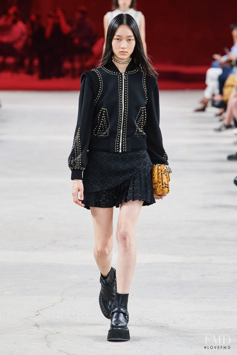 Chloe Oh featured in  the Ports 1961 fashion show for Spring/Summer 2023