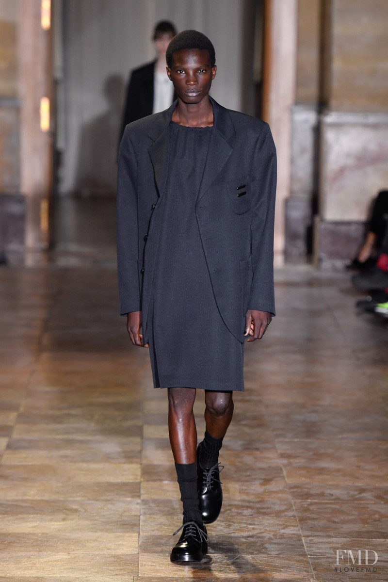 Dara Gueye featured in  the Raf Simons fashion show for Spring/Summer 2022