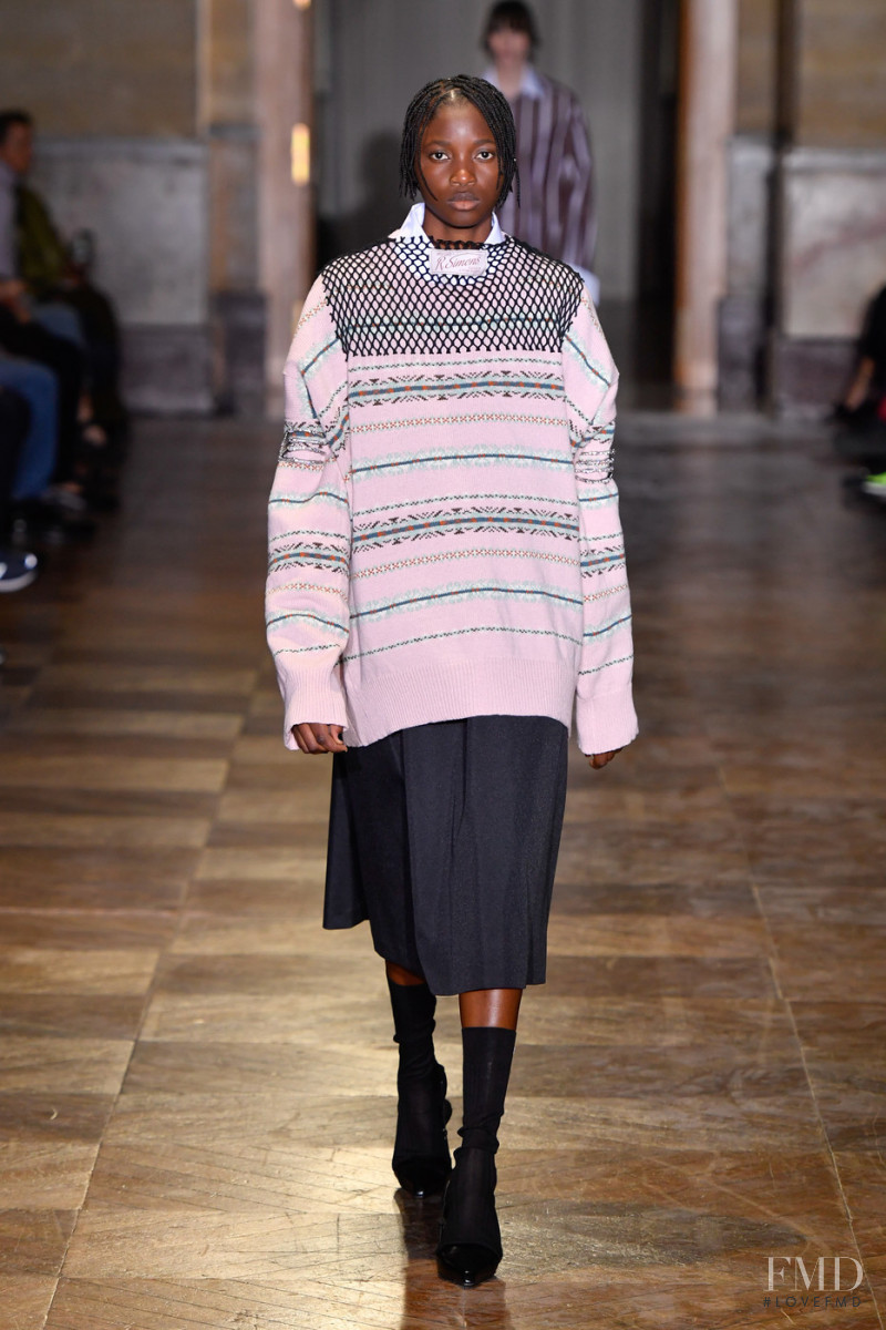 Tina Diedhiou featured in  the Raf Simons fashion show for Spring/Summer 2022