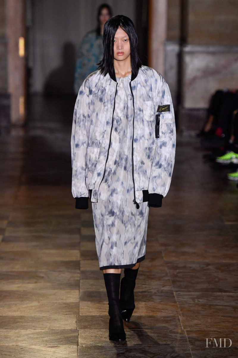 Yilan Hua featured in  the Raf Simons fashion show for Spring/Summer 2022