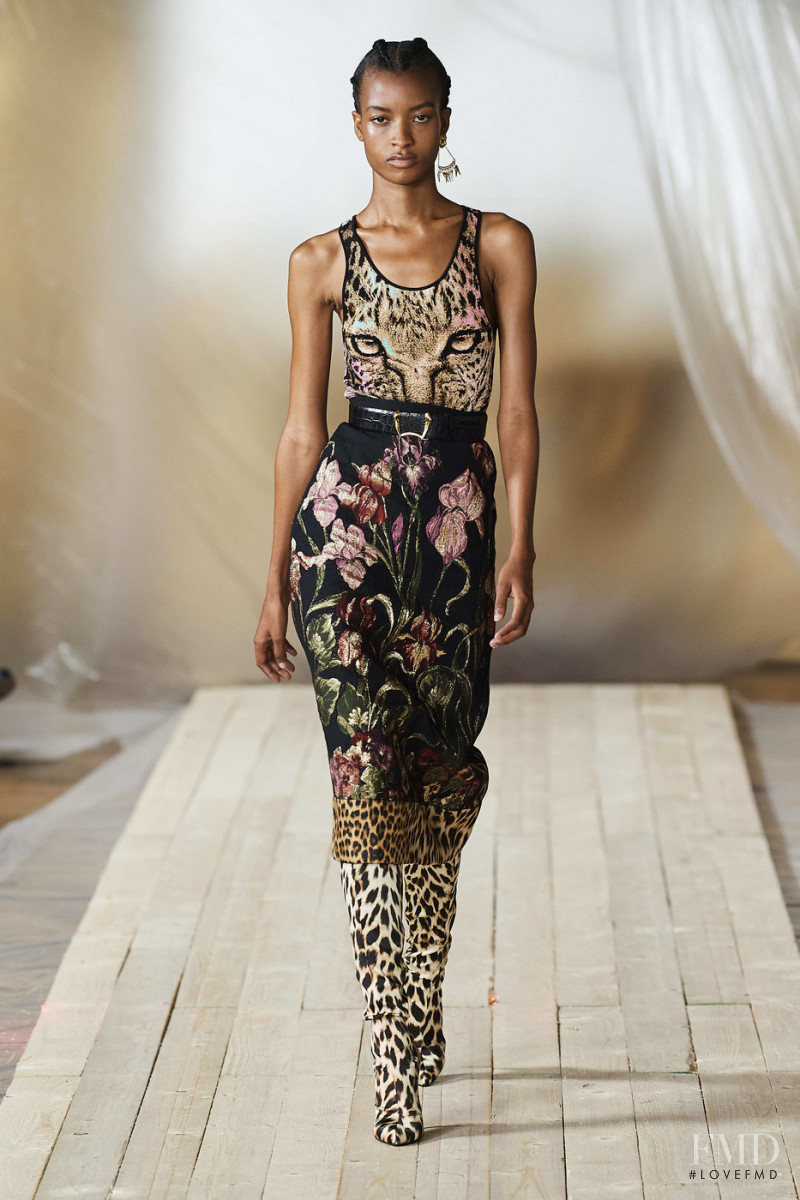 Saibatou Toure featured in  the Roberto Cavalli fashion show for Spring/Summer 2022