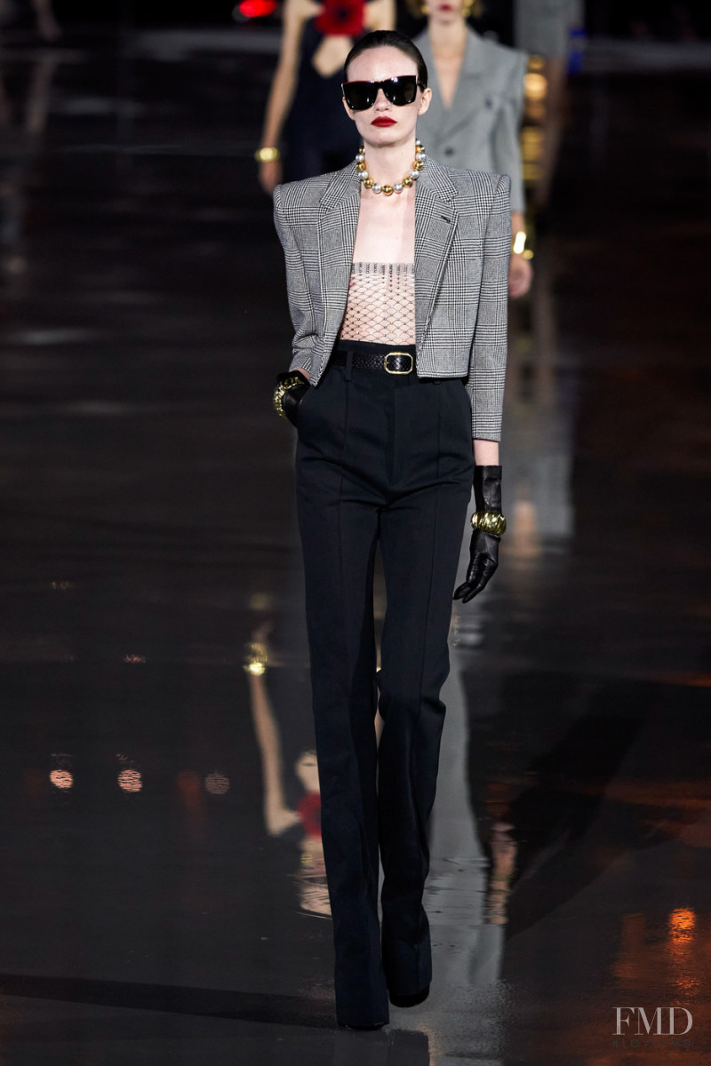 Megan Miles featured in  the Saint Laurent fashion show for Spring/Summer 2022