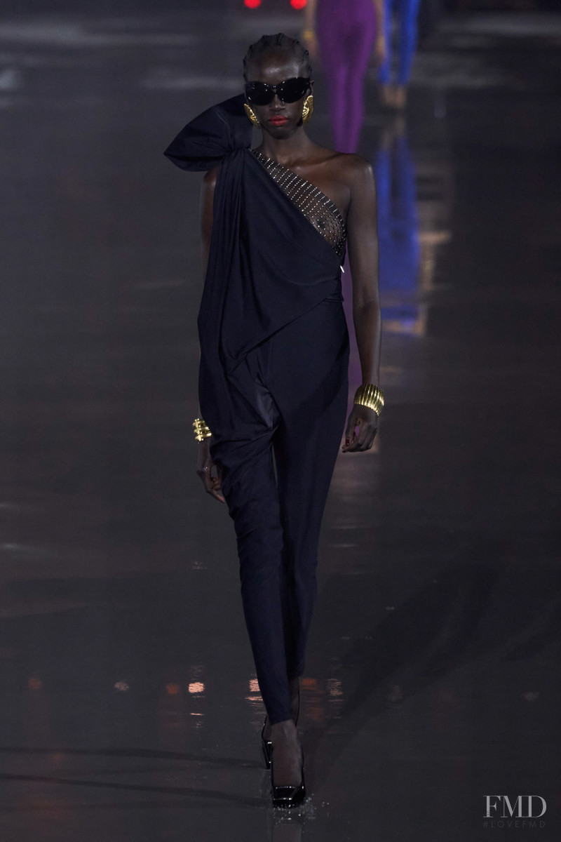 Anok Yai featured in  the Saint Laurent fashion show for Spring/Summer 2022