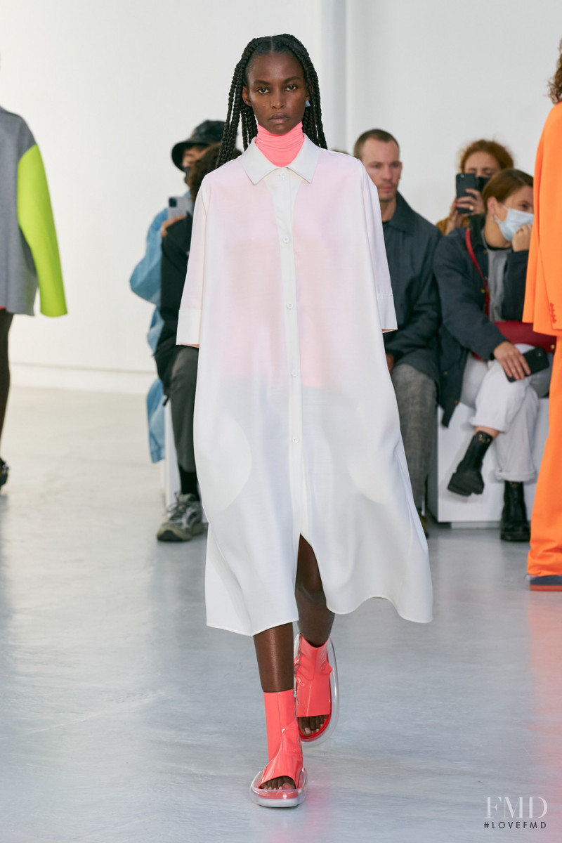 Christine Munezero featured in  the Shang Xia fashion show for Spring/Summer 2022