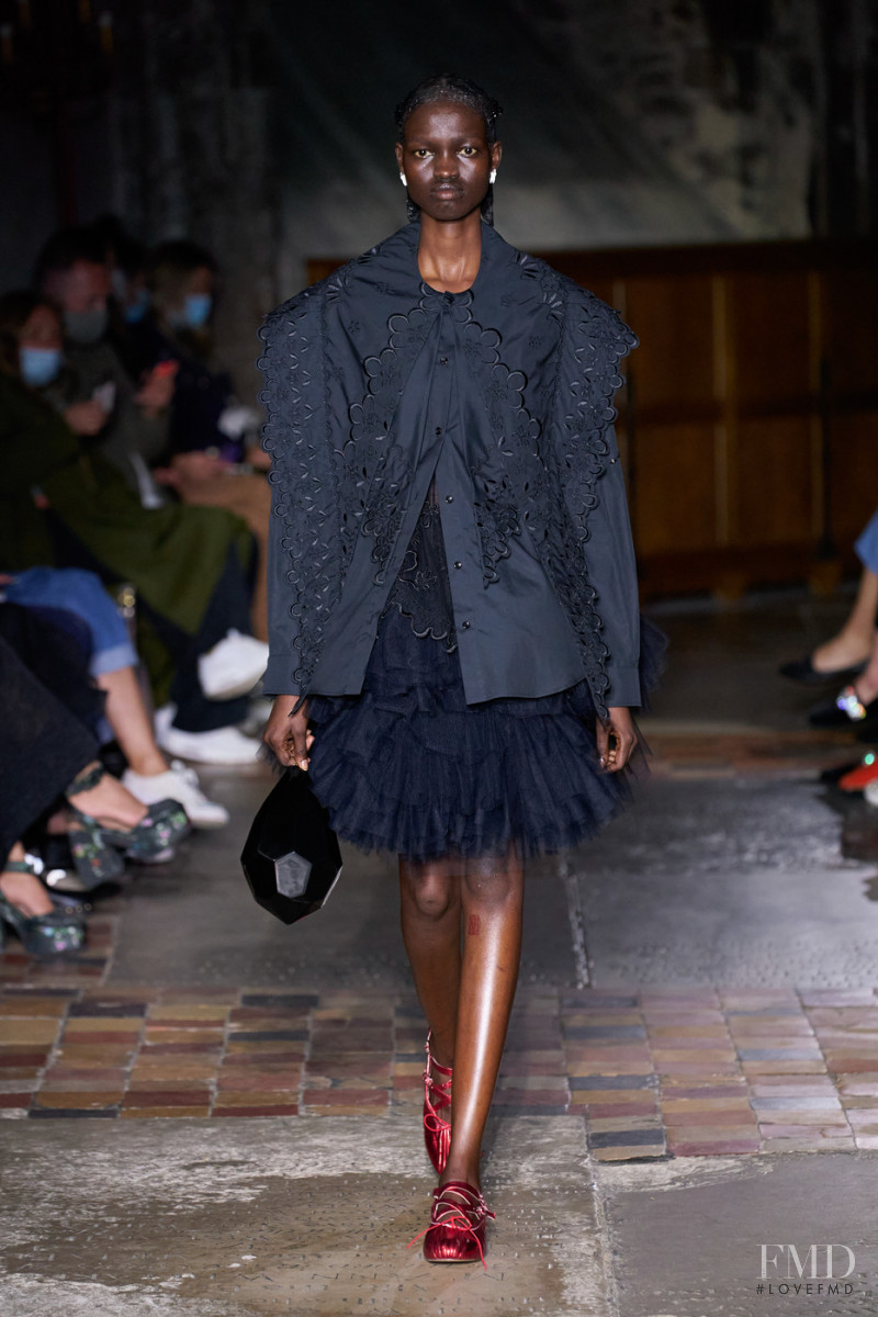 Diana Achan featured in  the Simone Rocha fashion show for Spring/Summer 2022