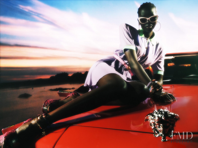 Adut Akech Bior featured in  the Versace advertisement for Holiday 2020