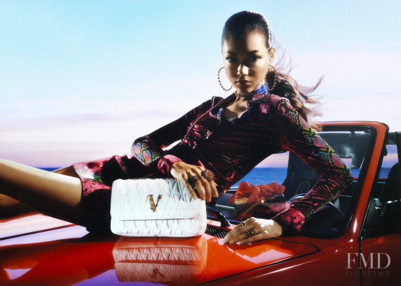 Mika Schneider featured in  the Versace advertisement for Holiday 2020