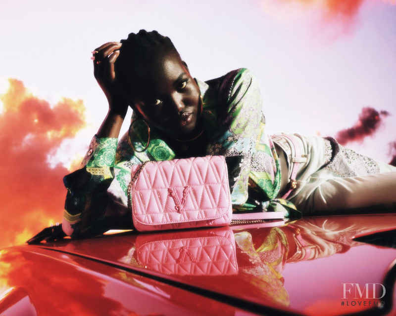 Adut Akech Bior featured in  the Versace advertisement for Holiday 2020