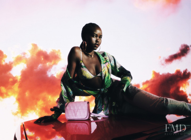 Adut Akech Bior featured in  the Versace advertisement for Holiday 2020