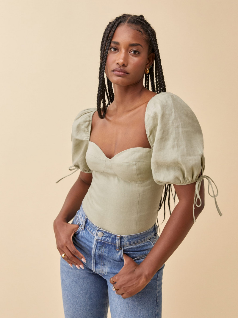 Melodie Monrose featured in  the Reformation catalogue for Spring/Summer 2021