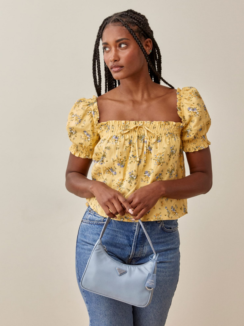 Melodie Monrose featured in  the Reformation catalogue for Spring/Summer 2021