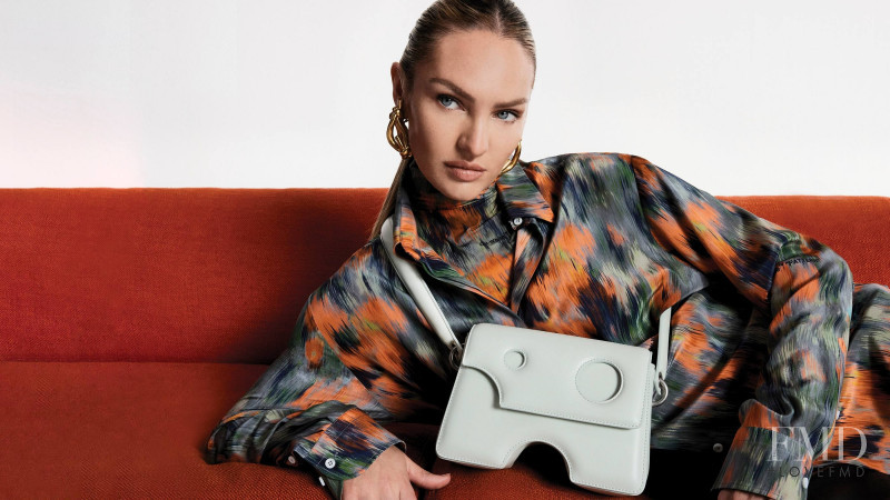 Candice Swanepoel featured in  the Off-White Burrow Bag advertisement for Autumn/Winter 2021