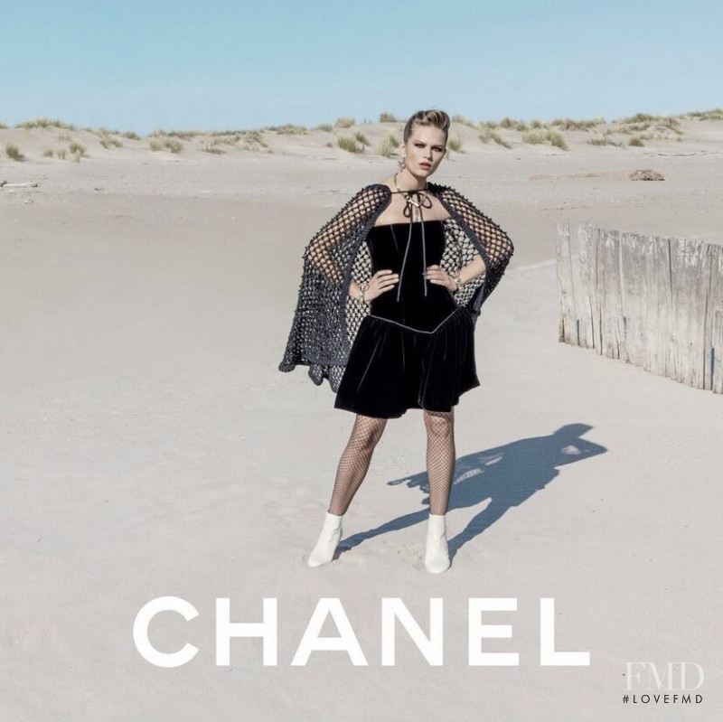 Anna Ewers featured in  the Chanel advertisement for Cruise 2022