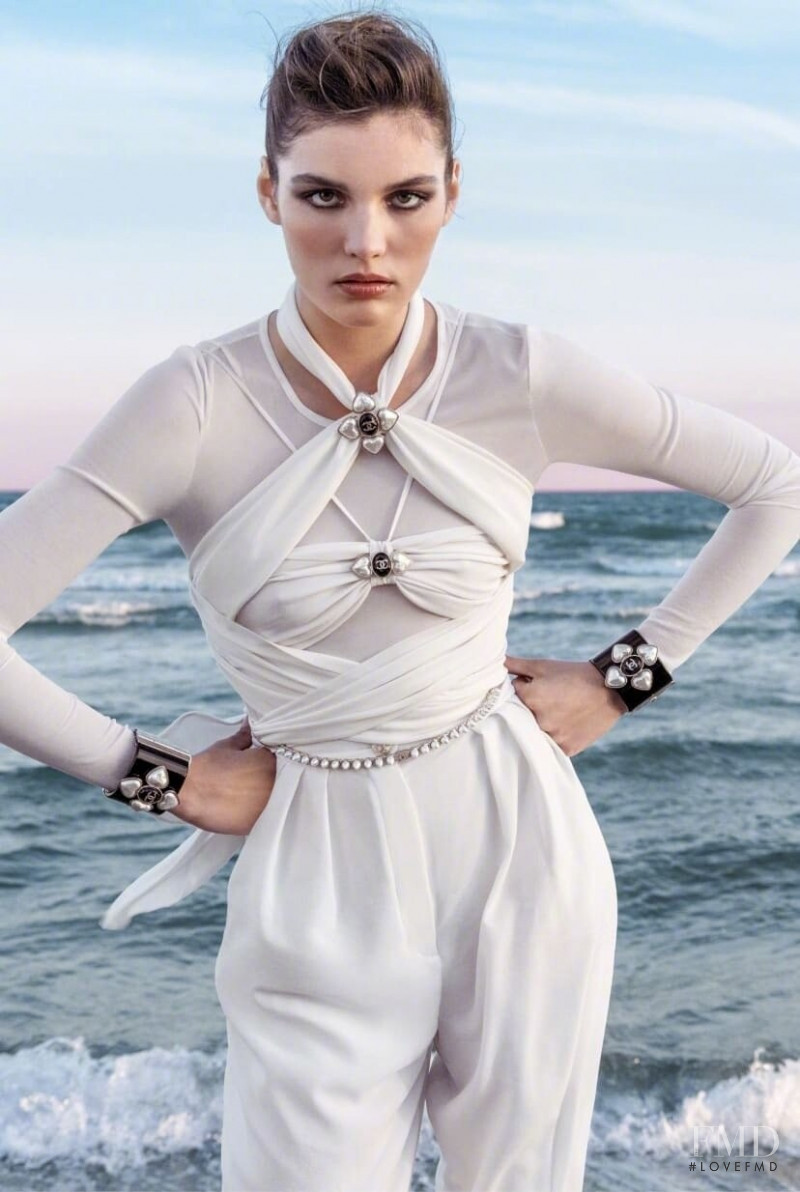 Lola Nicon featured in  the Chanel advertisement for Cruise 2022