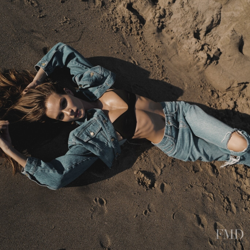Josephine Skriver featured in  the Triarchy advertisement for Resort 2022