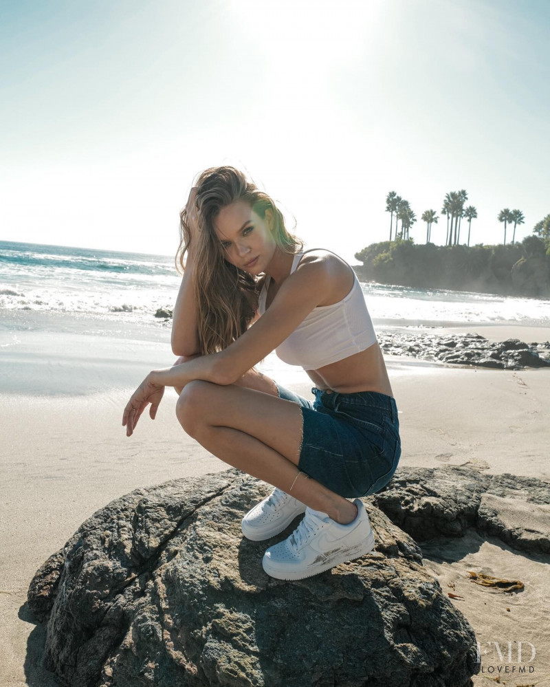 Josephine Skriver featured in  the Triarchy advertisement for Resort 2022