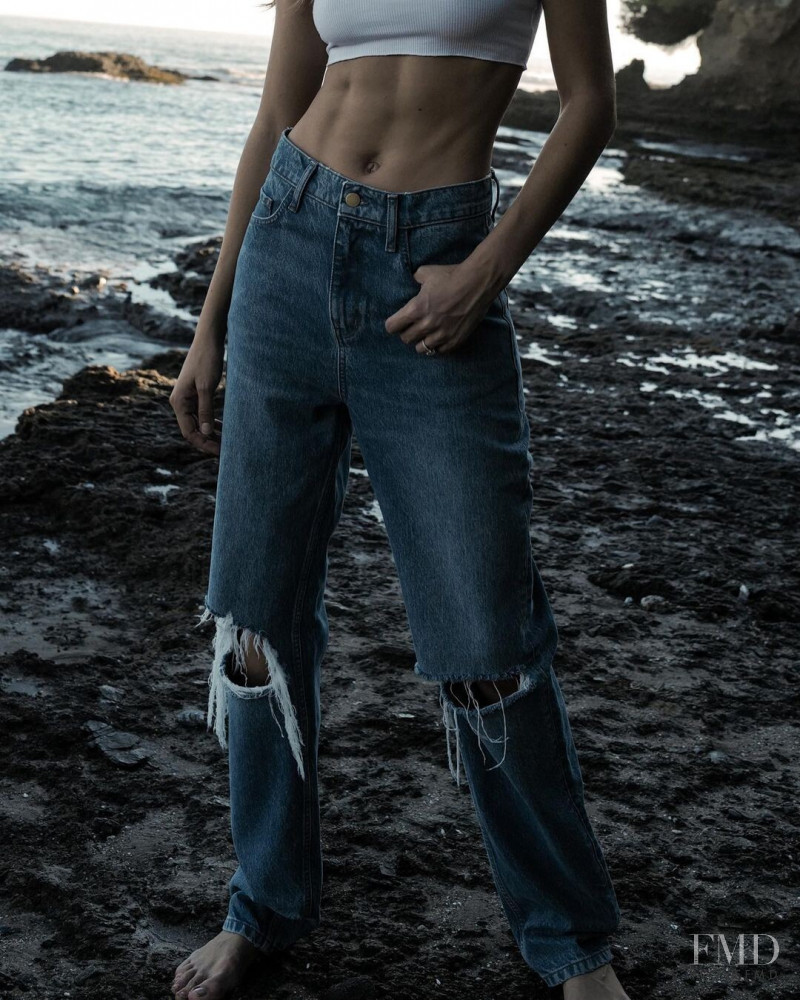Josephine Skriver featured in  the Triarchy advertisement for Resort 2022
