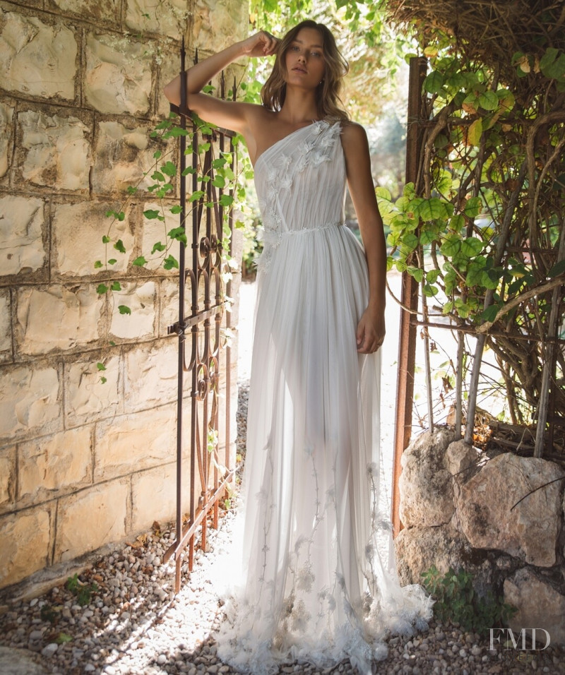 Maelys Garouis featured in  the Flora Bridal lookbook for Autumn/Winter 2021