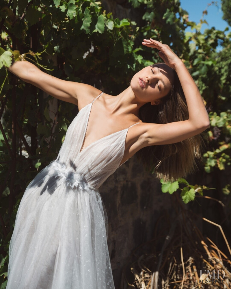 Maelys Garouis featured in  the Flora Bridal lookbook for Autumn/Winter 2021