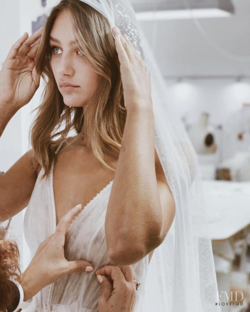 Maelys Garouis featured in  the Flora Bridal lookbook for Autumn/Winter 2021