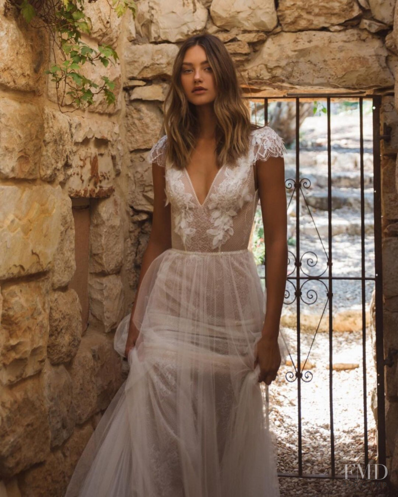 Maelys Garouis featured in  the Flora Bridal lookbook for Autumn/Winter 2021