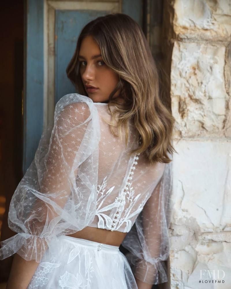 Maelys Garouis featured in  the Flora Bridal lookbook for Autumn/Winter 2021