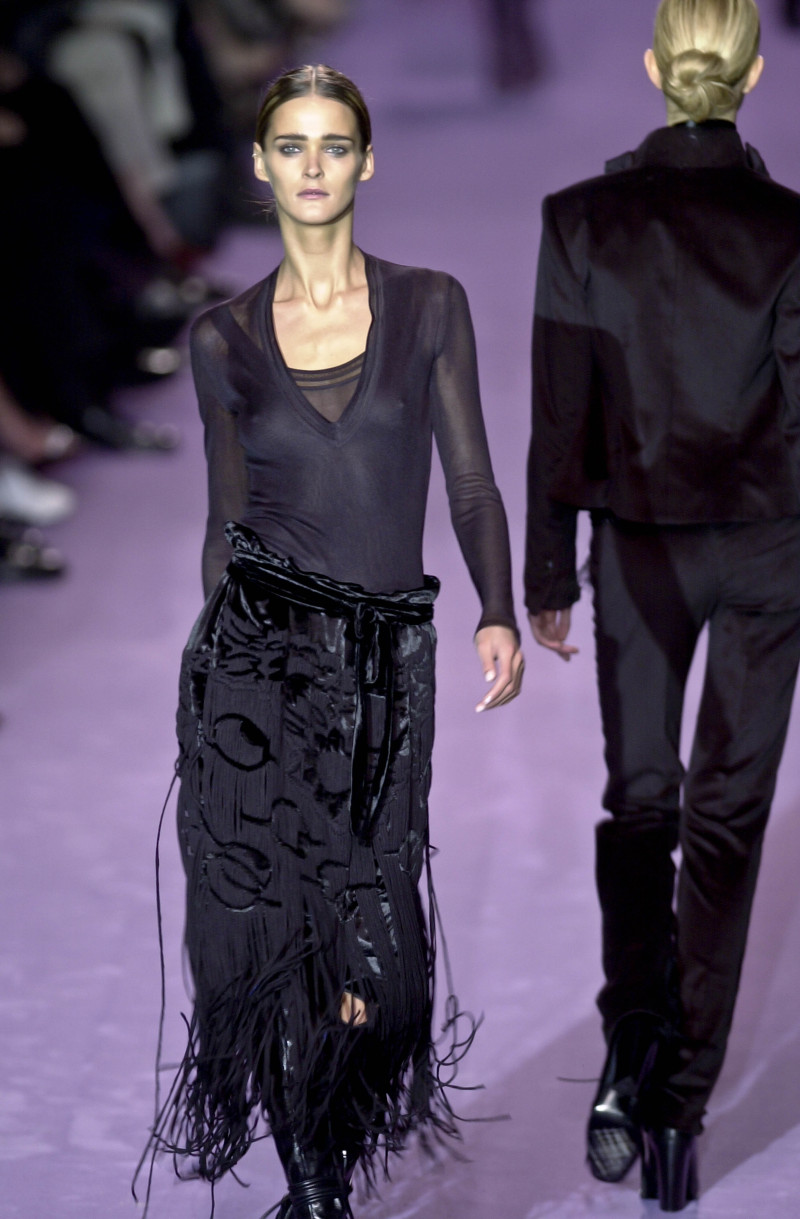 Carmen Kass featured in  the Saint Laurent fashion show for Autumn/Winter 2001