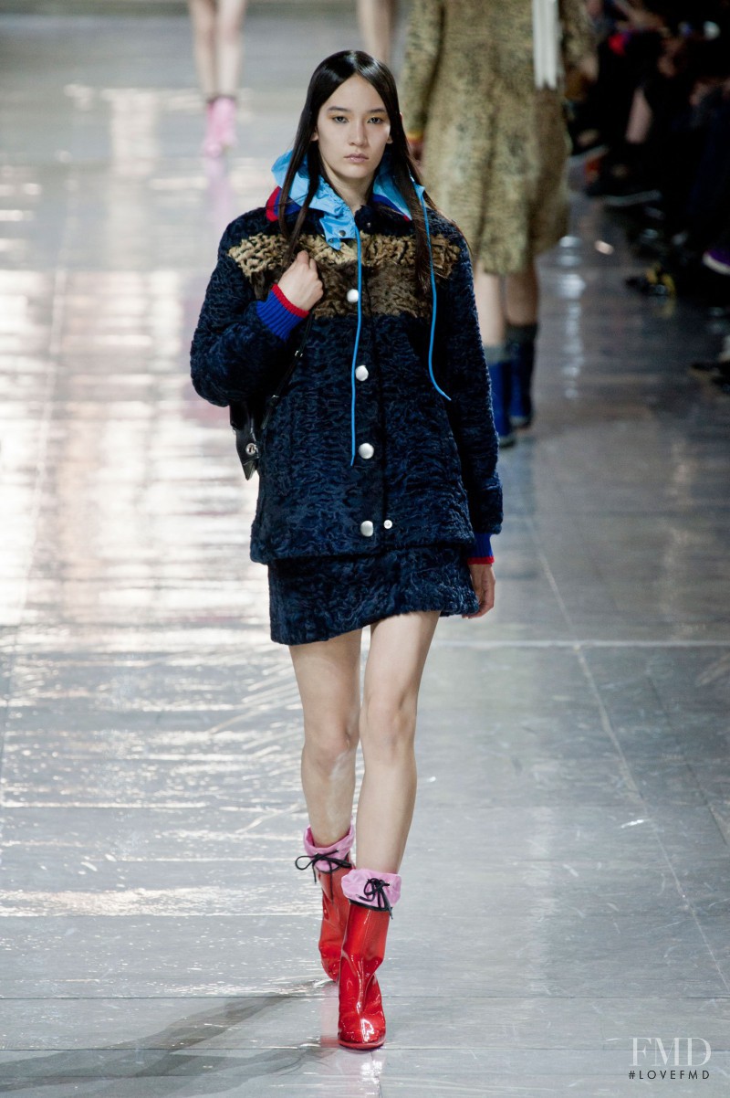 Mona Matsuoka featured in  the Miu Miu fashion show for Autumn/Winter 2014