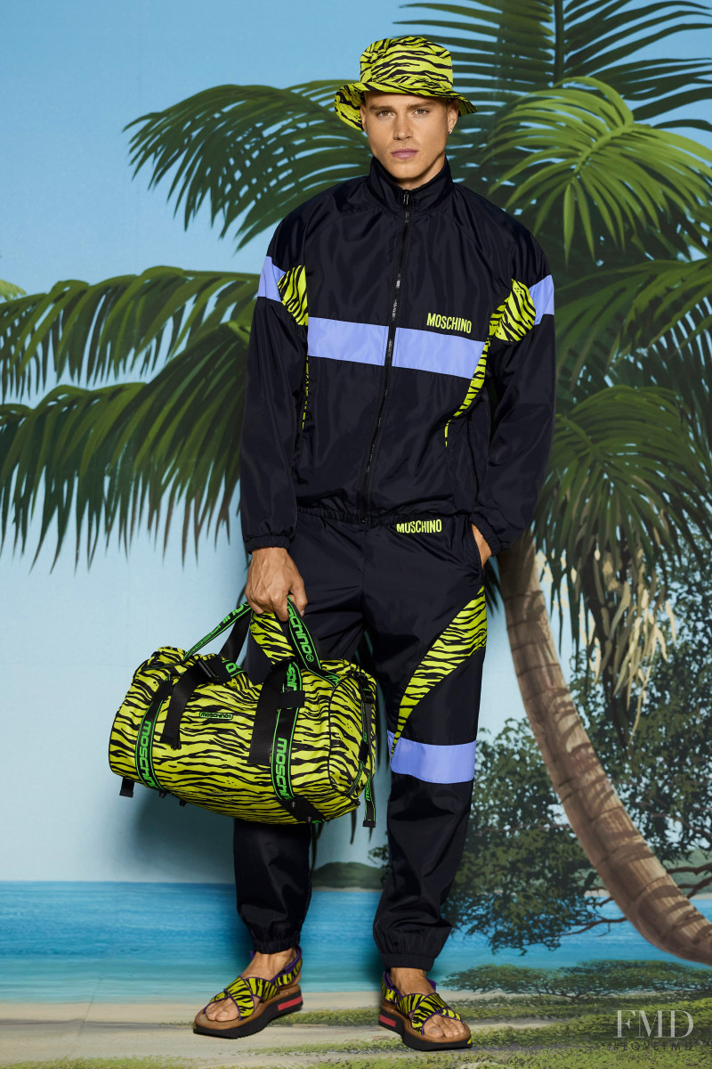 Matthew Noszka featured in  the Moschino lookbook for Resort 2022