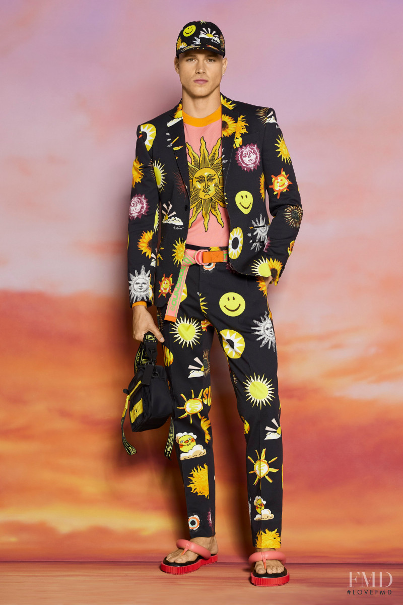 Matthew Noszka featured in  the Moschino lookbook for Resort 2022