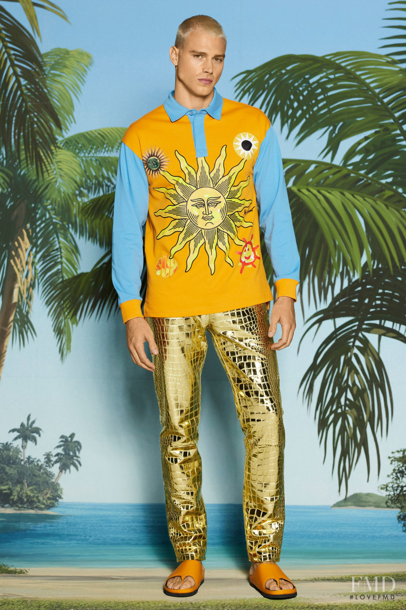 Matthew Noszka featured in  the Moschino lookbook for Resort 2022