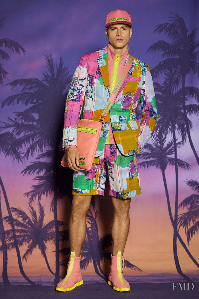 Matthew Noszka featured in  the Moschino lookbook for Resort 2022