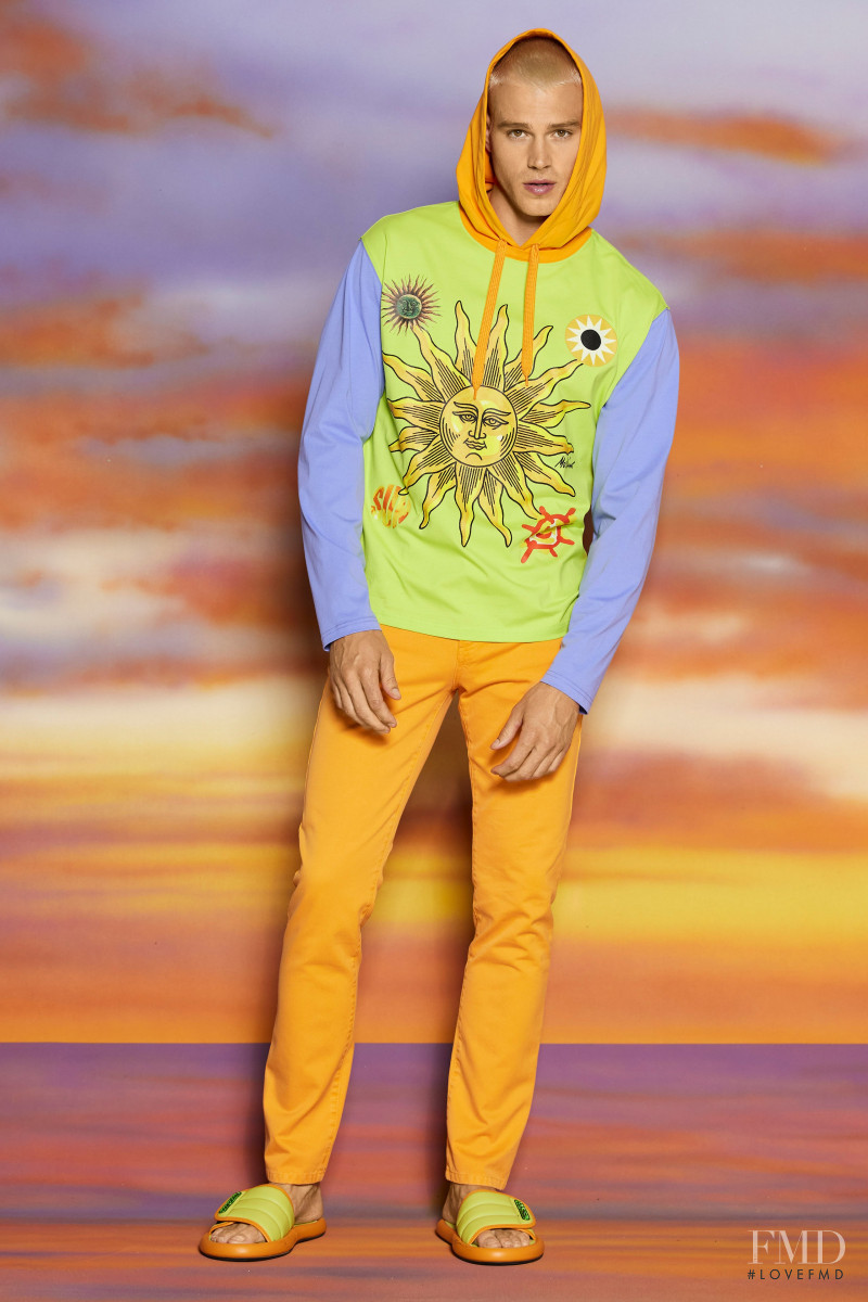 Matthew Noszka featured in  the Moschino lookbook for Resort 2022